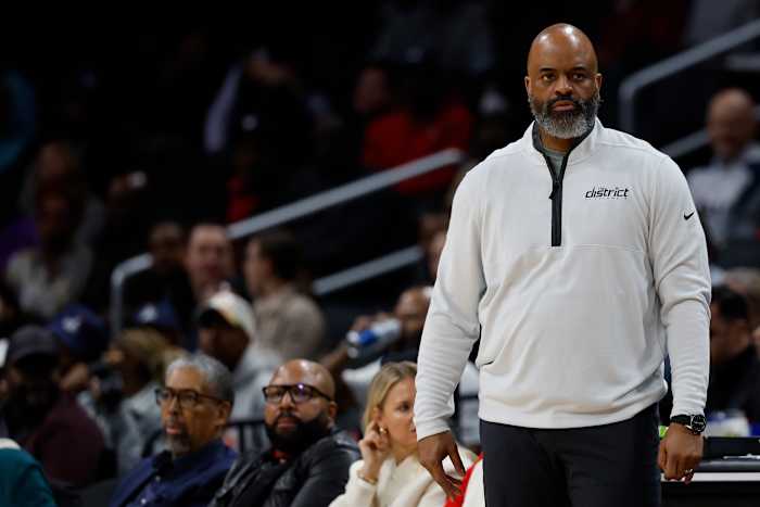 Washington Wizards head coach Wes Unseld Jr. looks on from the bench against the Philadelphia 76ers in the second quarter at Capital One Arena.